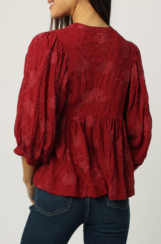 image of a female model wearing a MALIA 3/4 V-NECK TOP RED DAHLIA DEAR JOHN DENIM 
