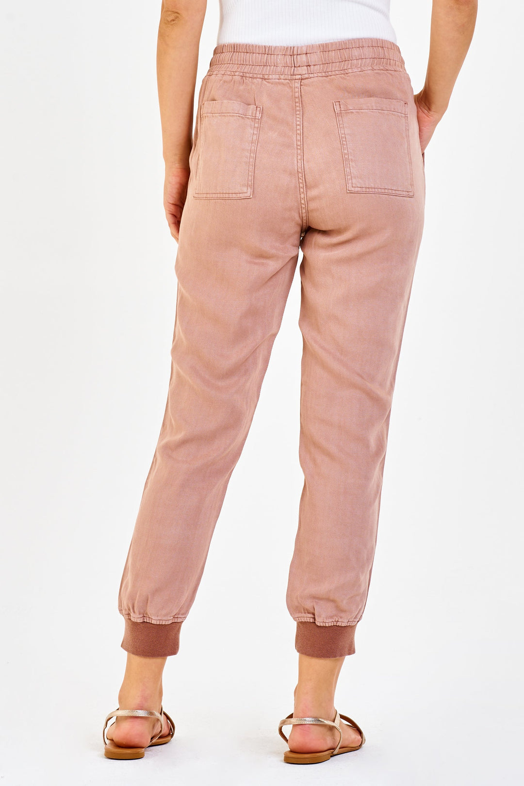 image of a female model wearing a JACEY SUPER HIGH RISE CROPPED JOGGER PANTS CLAY DEAR JOHN DENIM 