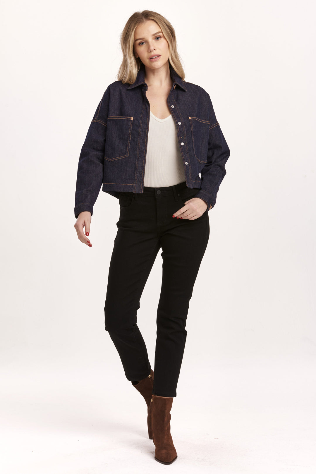 image of a female model wearing a GINA CROPPED DENIM SHIRT JACKET DARK DENIM DEAR JOHN DENIM 