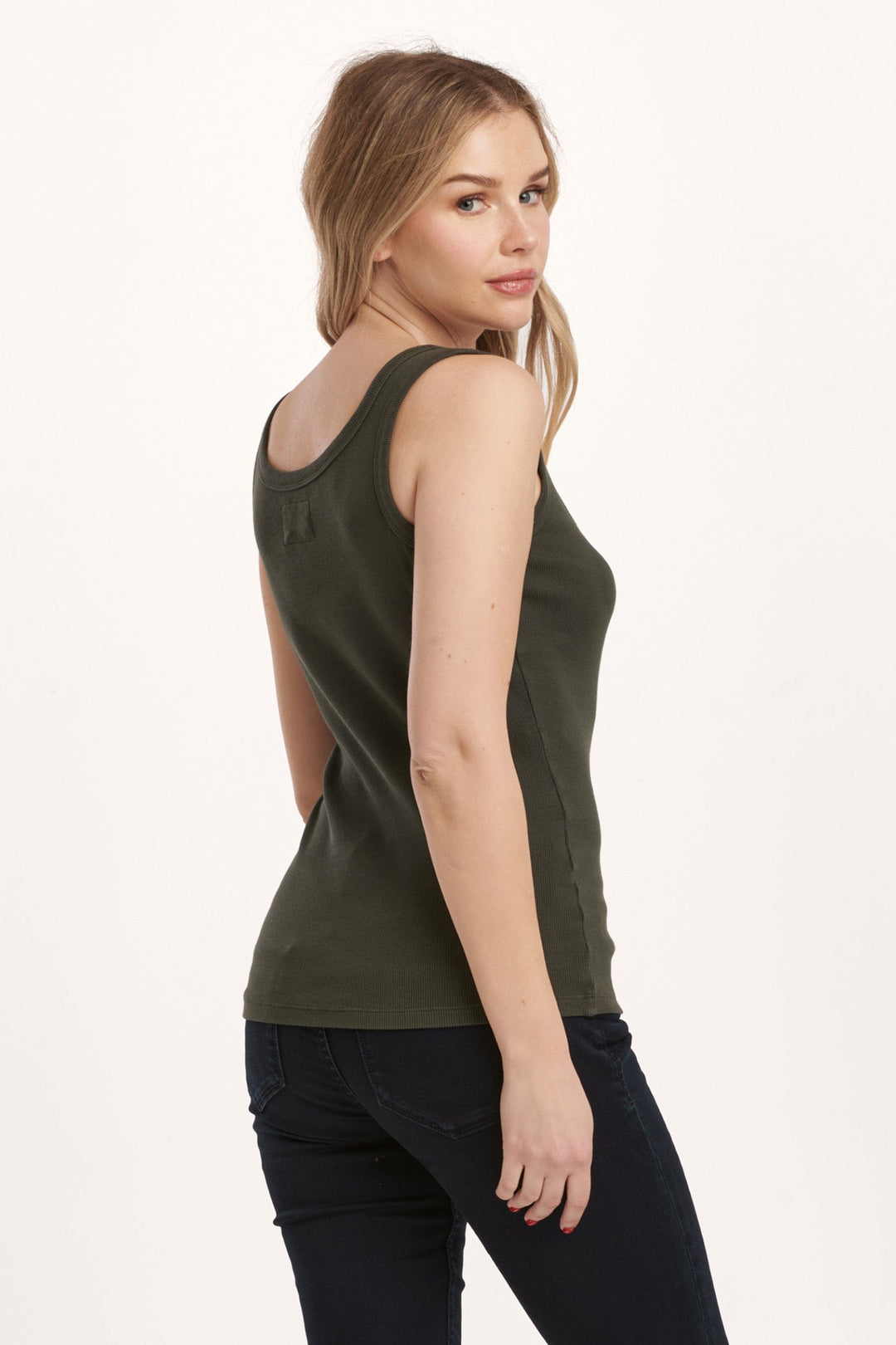 image of a female model wearing a PAULA SCOOP TANK DEEP EMERALD DEAR JOHN DENIM 