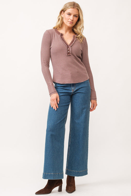 image of a female model wearing a LUNA V-NECK LONG SLEEVE FITTED TOP MARRON DEAR JOHN DENIM 