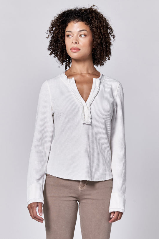 image of a female model wearing a LUNA V-NECK LONG SLEEVE FITTED TOP WHITE DEAR JOHN DENIM 