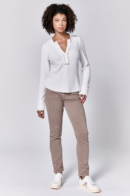 image of a female model wearing a LUNA V-NECK LONG SLEEVE FITTED TOP WHITE DEAR JOHN DENIM 