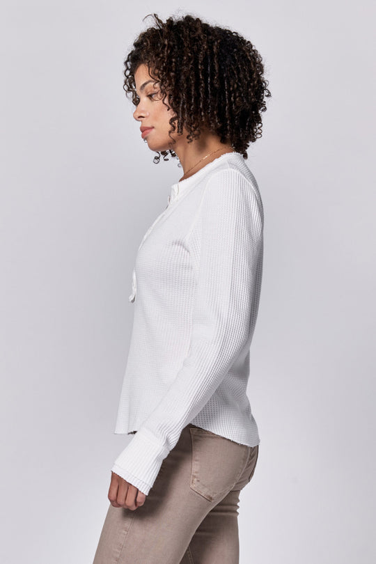 image of a female model wearing a LUNA V-NECK LONG SLEEVE FITTED TOP WHITE DEAR JOHN DENIM 