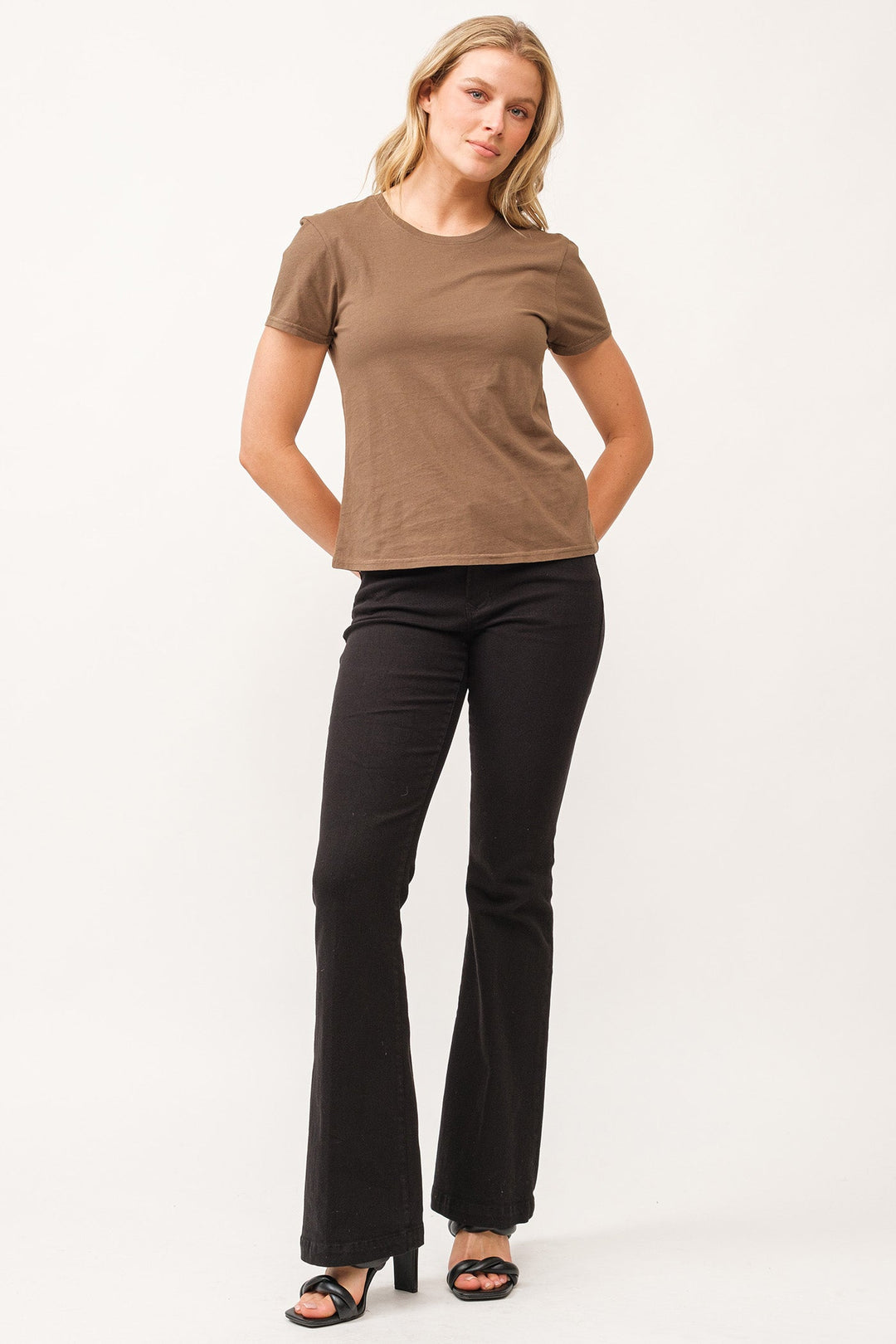 image of a female model wearing a UNITY CREW NECK SHORT SLEEVE RELAXED FIT TOP DARK OLIVE DEAR JOHN DENIM 