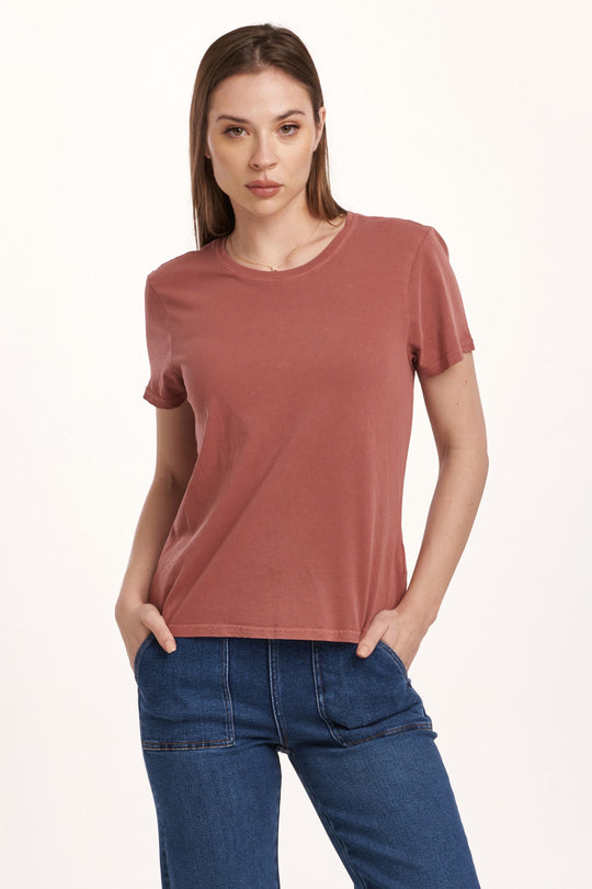 image of a female model wearing a UNITY SHORT SLEEVE JERSEY TEE INTENSE RUST DEAR JOHN DENIM 