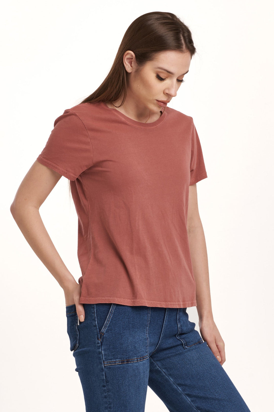 image of a female model wearing a UNITY SHORT SLEEVE JERSEY TEE INTENSE RUST DEAR JOHN DENIM 