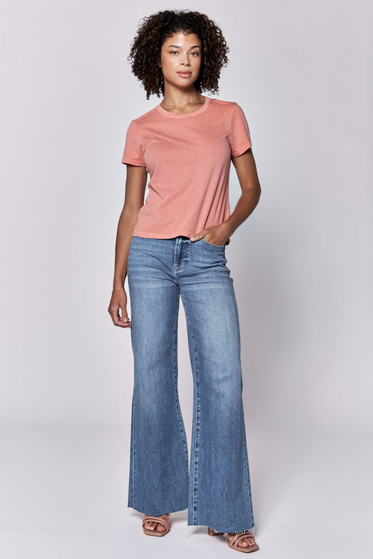 image of a female model wearing a UNITY CREW NECK SHORT SLEEVE RELAXED FIT TOP TERRACOTTA DEAR JOHN DENIM 