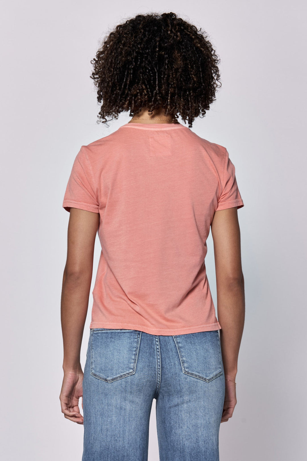 image of a female model wearing a UNITY CREW NECK SHORT SLEEVE RELAXED FIT TOP TERRACOTTA DEAR JOHN DENIM 