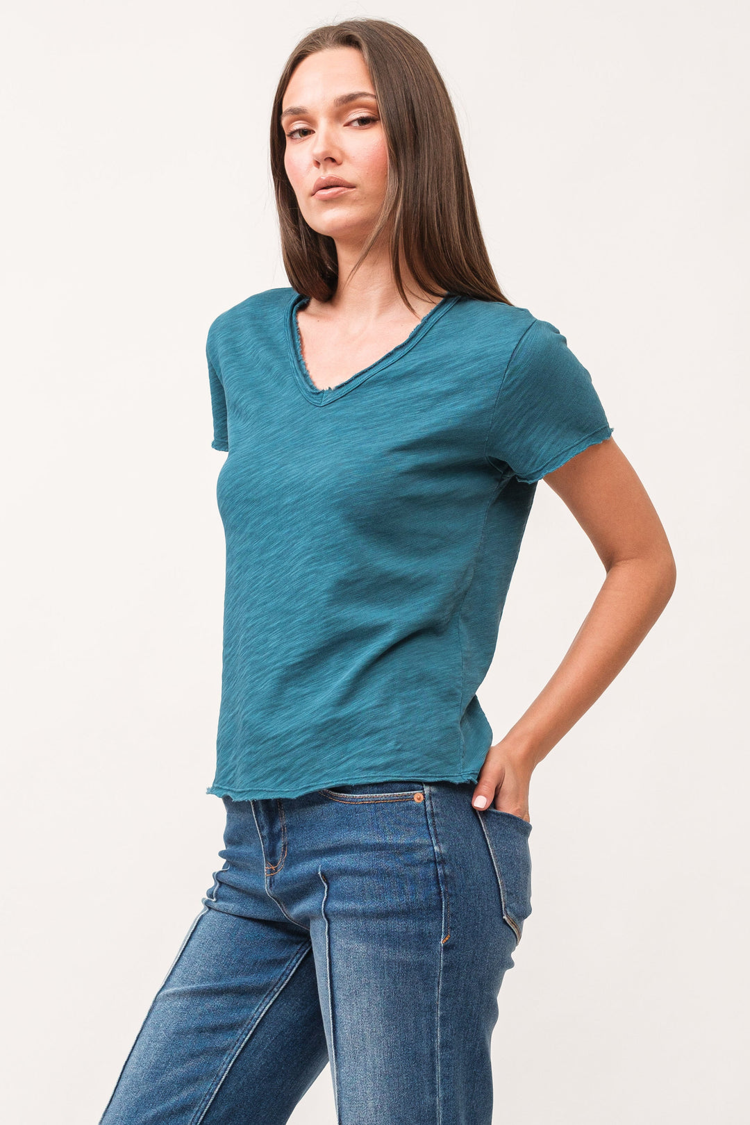 image of a female model wearing a VANYA V-NECK SHORT SLEEVE RELAXED FIT TOP DEEP TEAL DEAR JOHN DENIM 