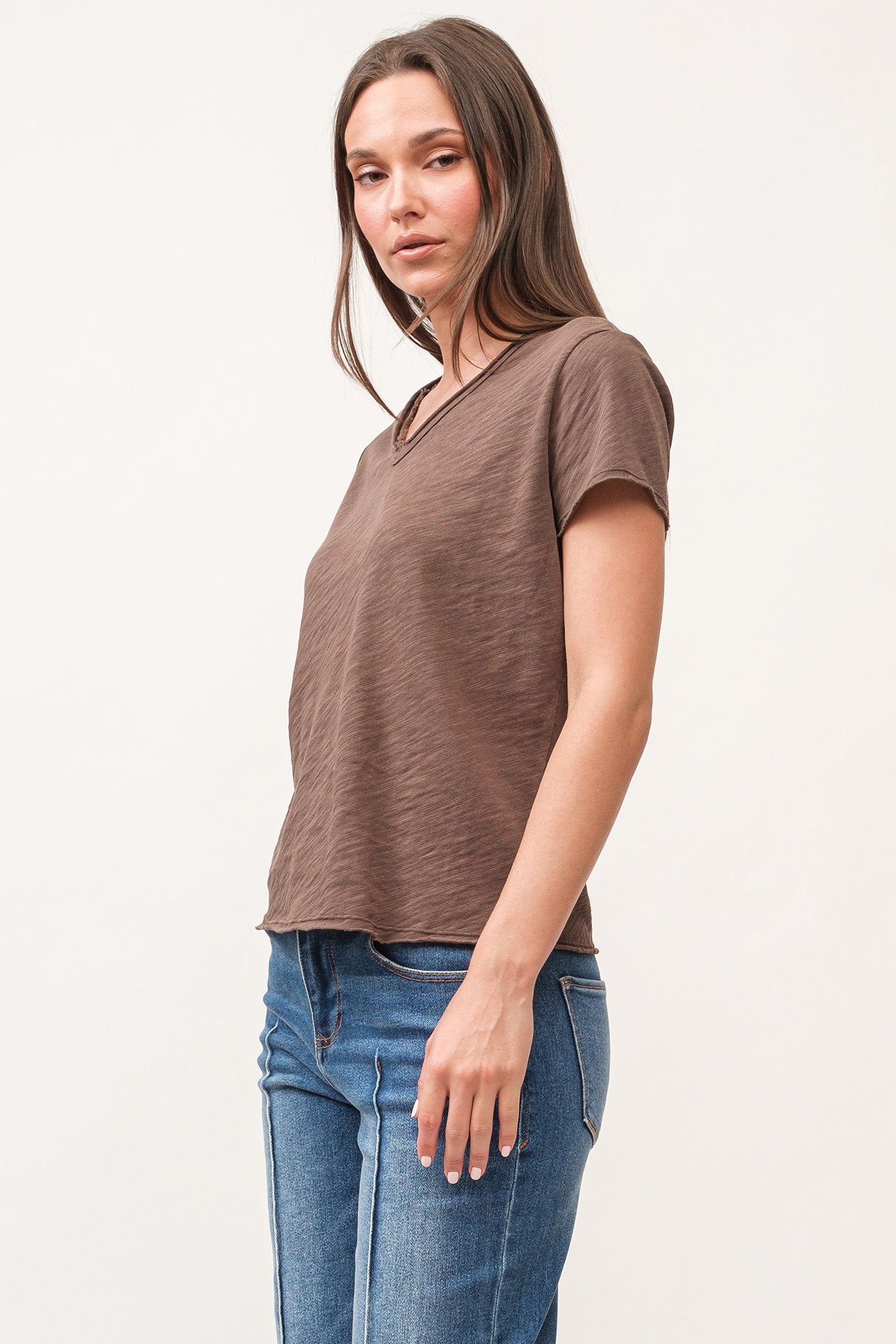 image of a female model wearing a VANYA V-NECK SHORT SLEEVE RELAXED FIT TOP DARK OLIVE DEAR JOHN DENIM 