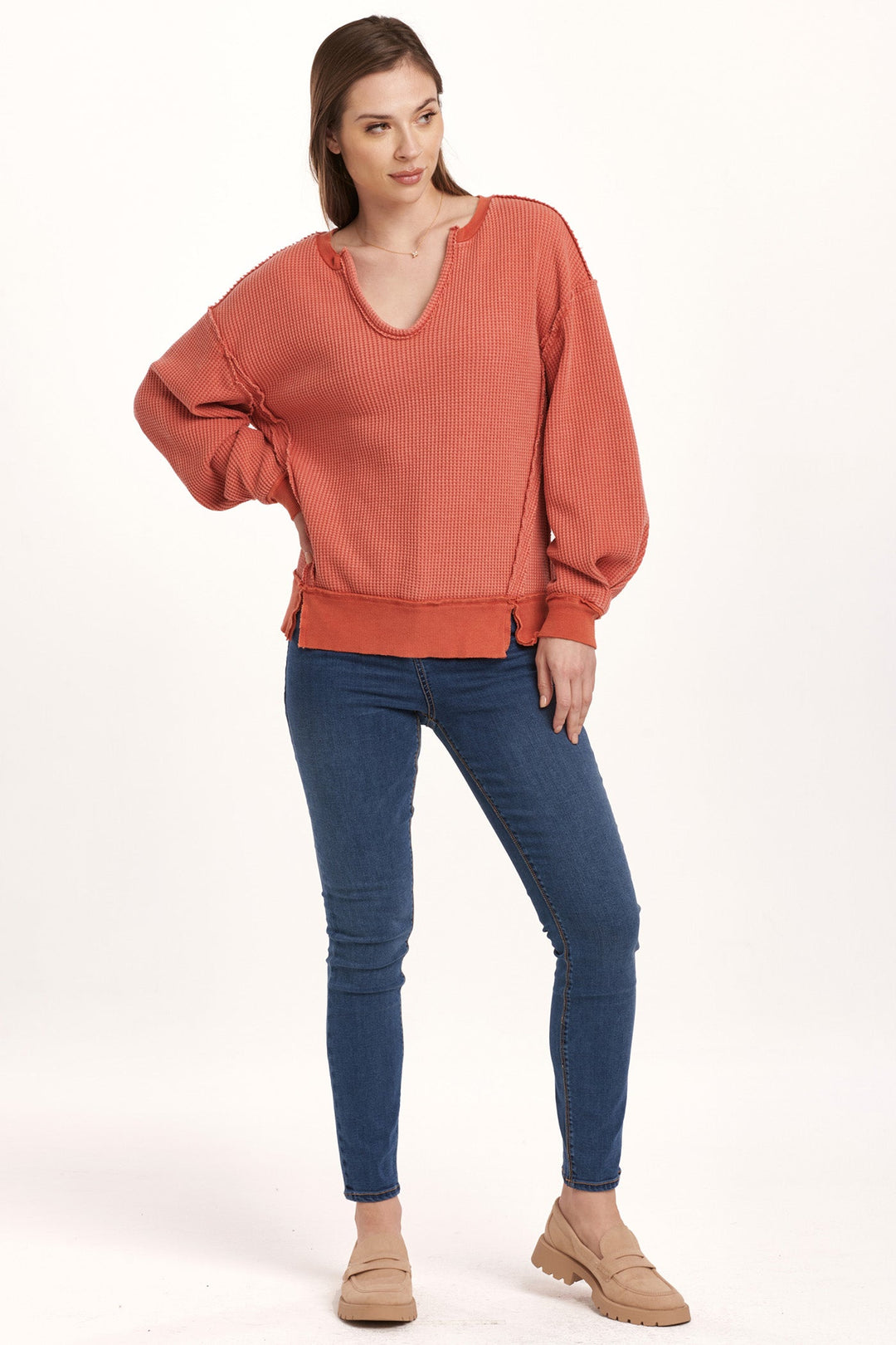 image of a female model wearing a ZYRA THERMAL OVERSIZED TOP CRIMSON DEAR JOHN DENIM 