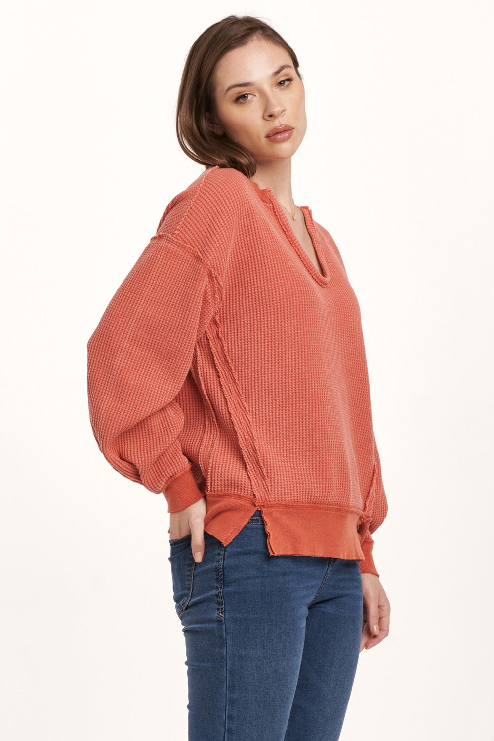 image of a female model wearing a ZYRA THERMAL OVERSIZED TOP CRIMSON DEAR JOHN DENIM 