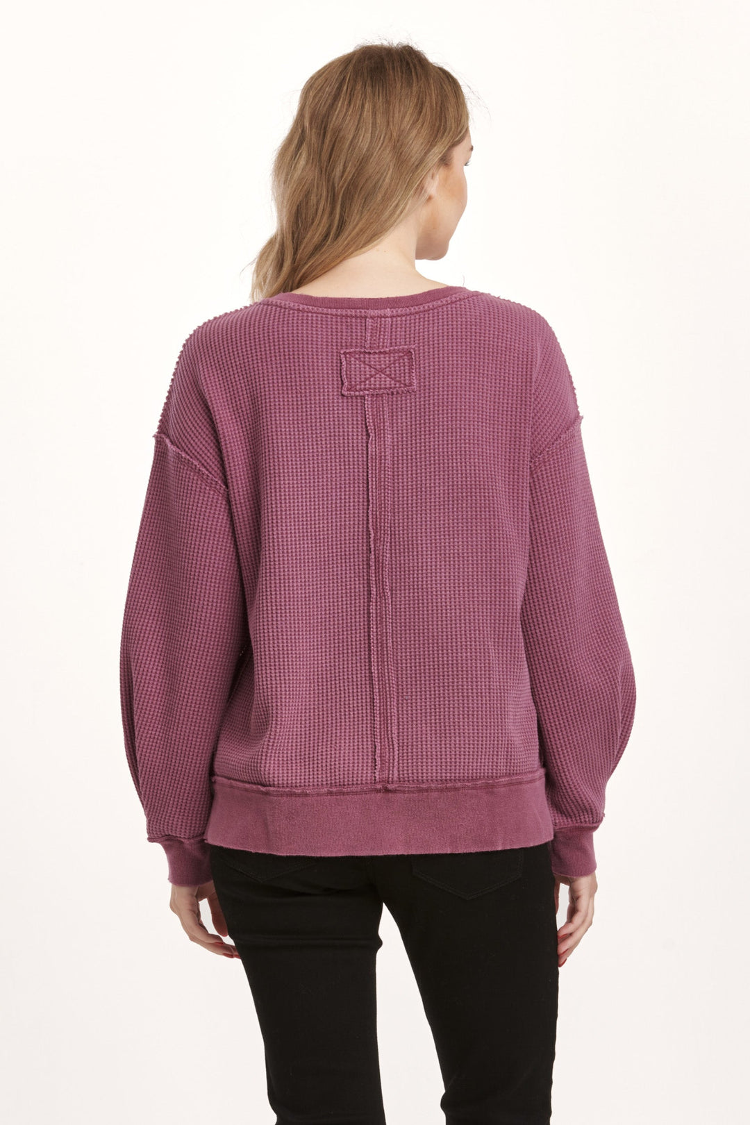 image of a female model wearing a ZYRA THERMAL OVERSIZED TOP PLUM BERRY DEAR JOHN DENIM 