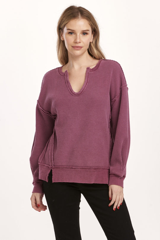 image of a female model wearing a ZYRA THERMAL OVERSIZED TOP PLUM BERRY DEAR JOHN DENIM 