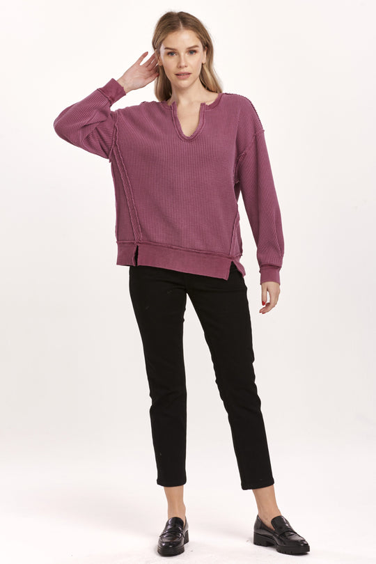 image of a female model wearing a ZYRA THERMAL OVERSIZED TOP PLUM BERRY DEAR JOHN DENIM 