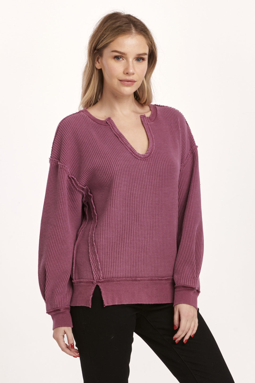 image of a female model wearing a ZYRA THERMAL OVERSIZED TOP PLUM BERRY DEAR JOHN DENIM 