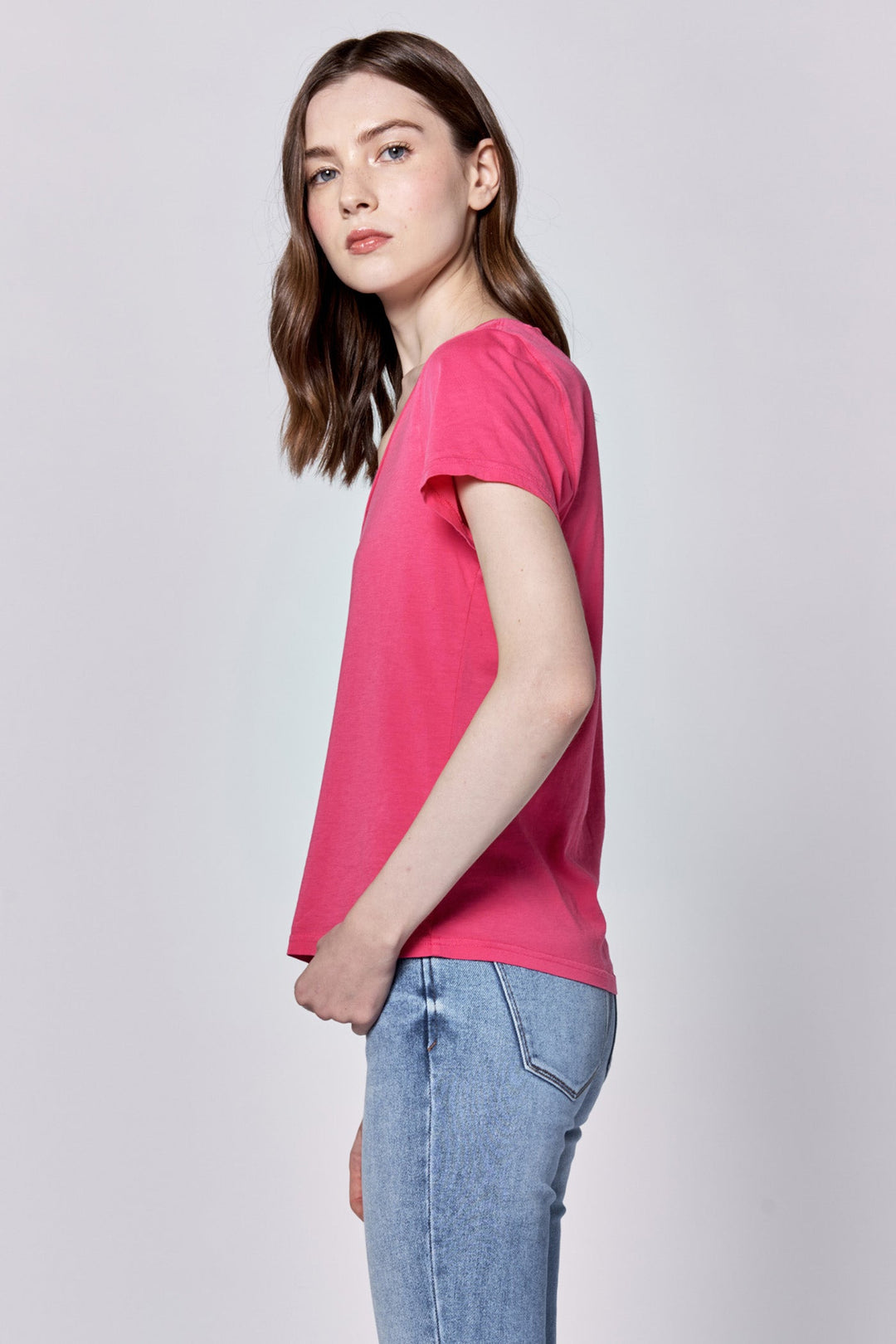 image of a female model wearing a MADELYN V-NECK SHORT SLEEVE RELAXED FIT TOP RASPBERRY DEAR JOHN DENIM 