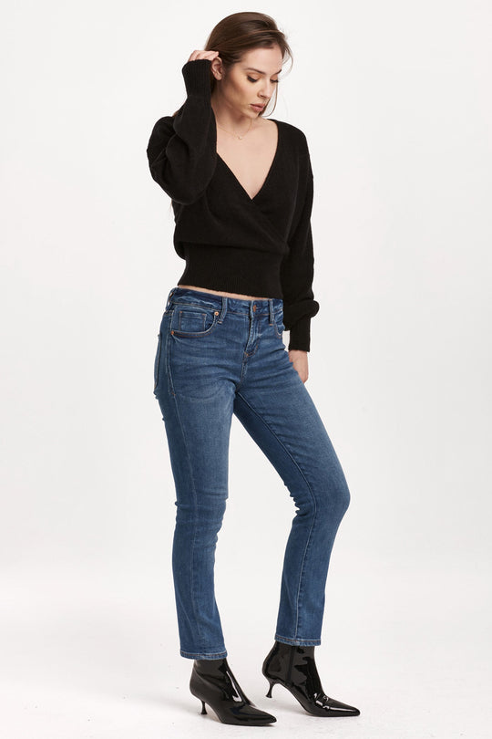 image of a female model wearing a CARTIER WRAP TOP BLACK DEAR JOHN DENIM 