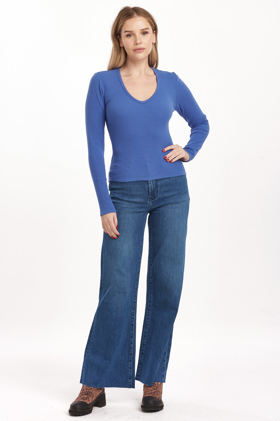 image of a female model wearing a MARLOWE V-NECK TOP BLUE LOLITE DEAR JOHN DENIM 