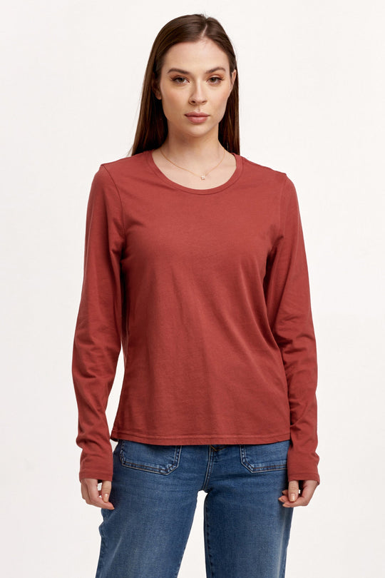 image of a female model wearing a KATHY LONG SLEEVE JERSEY TEE INTENSE RUST DEAR JOHN DENIM 