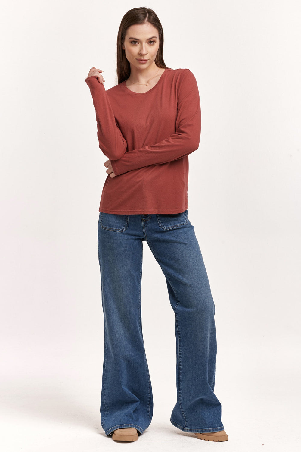image of a female model wearing a KATHY LONG SLEEVE JERSEY TEE INTENSE RUST DEAR JOHN DENIM 