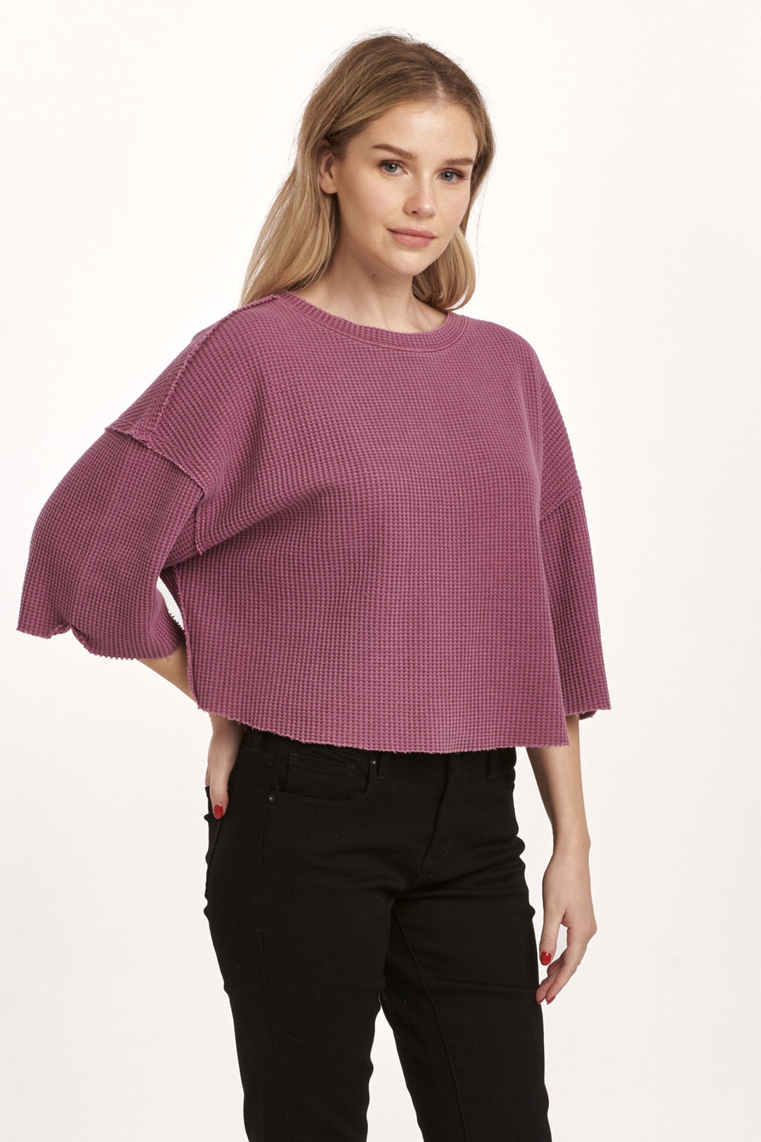 image of a female model wearing a AMIRA THERMAL WIDE SLEEVE TOP PLUM BERRY DEAR JOHN DENIM 