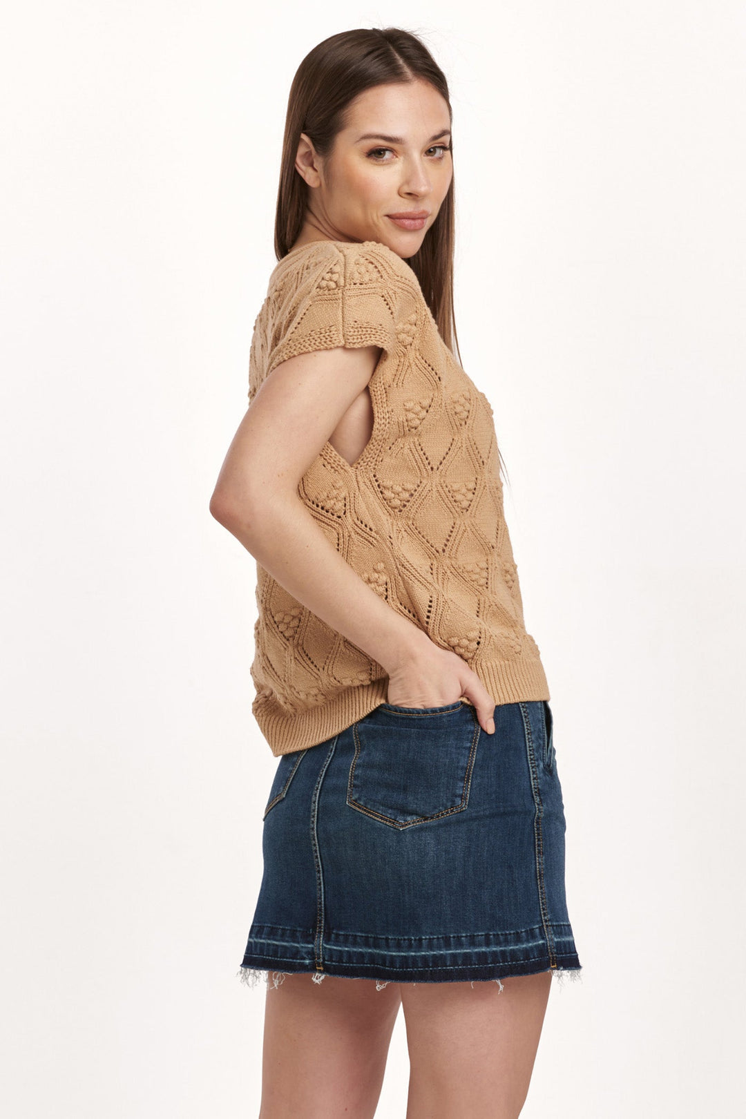 image of a female model wearing a ARI ROLL NECK SWEATER VEST LIGHT BROWN DEAR JOHN DENIM 