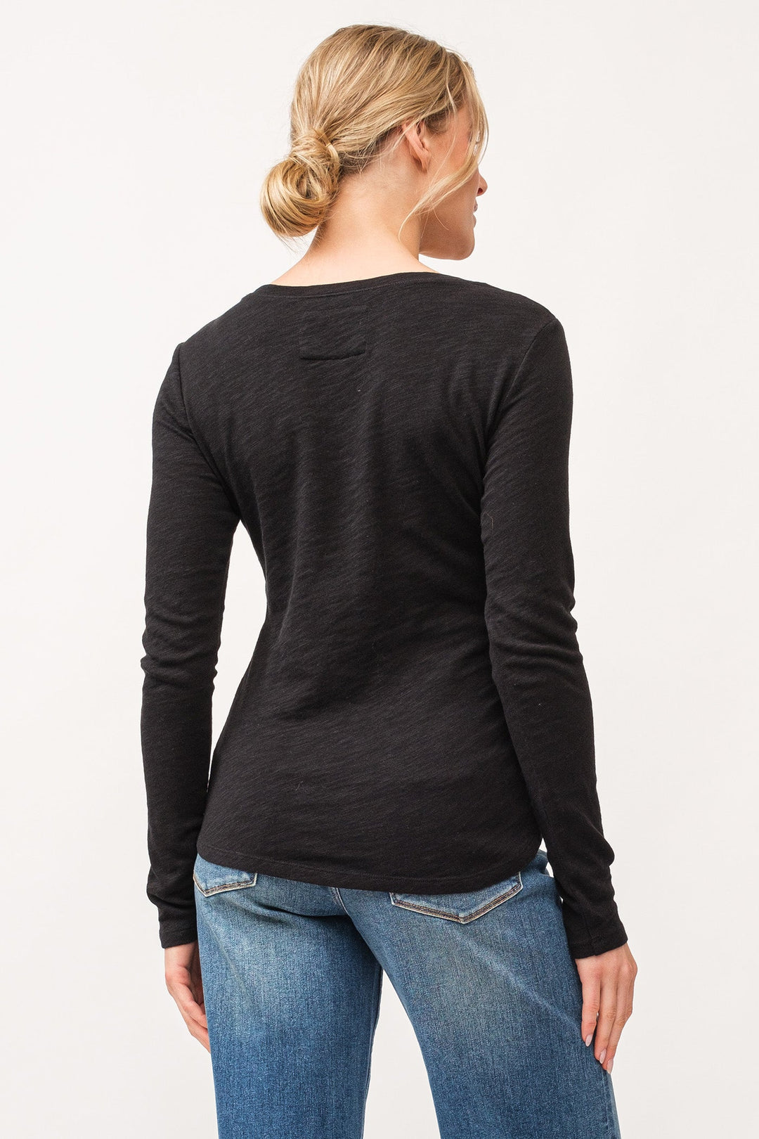 image of a female model wearing a ALINA V-NECK LONG SLEEVE CLASSIC FIT TOP BLACK DEAR JOHN DENIM 