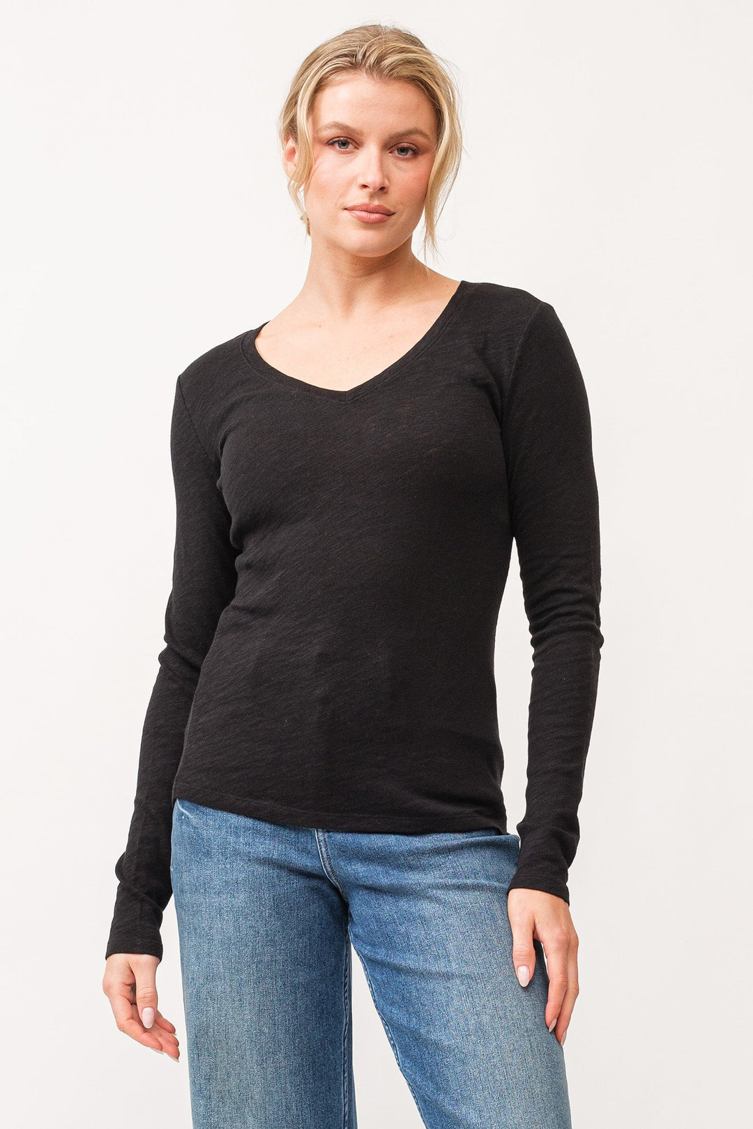 image of a female model wearing a ALINA V-NECK LONG SLEEVE CLASSIC FIT TOP BLACK DEAR JOHN DENIM 