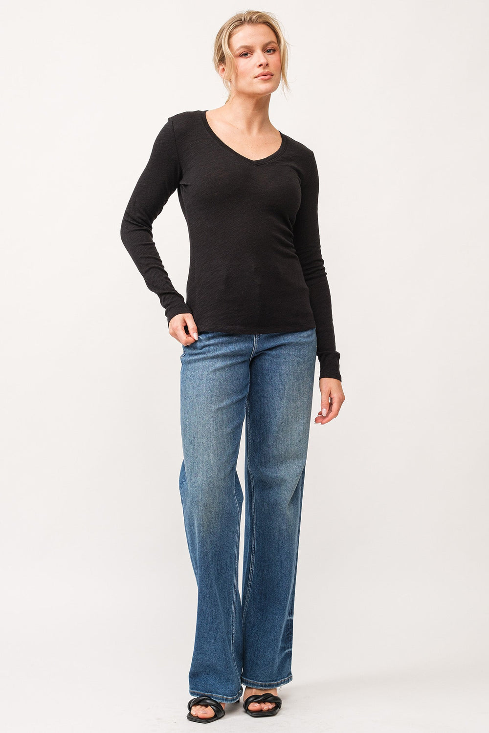 image of a female model wearing a ALINA V-NECK LONG SLEEVE CLASSIC FIT TOP BLACK DEAR JOHN DENIM 