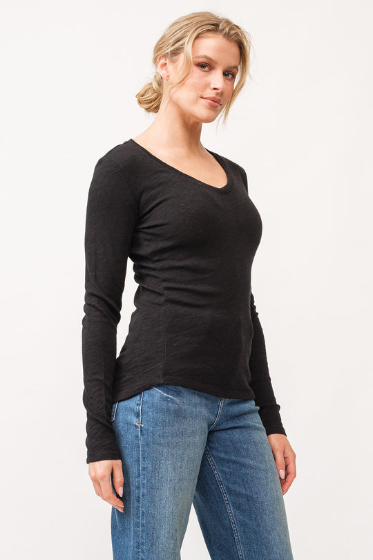 image of a female model wearing a ALINA V-NECK LONG SLEEVE CLASSIC FIT TOP BLACK DEAR JOHN DENIM 