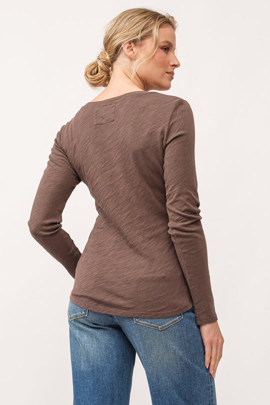 image of a female model wearing a ALINA V-NECK LONG SLEEVE CLASSIC FIT TOP DARK OLIVE DEAR JOHN DENIM 