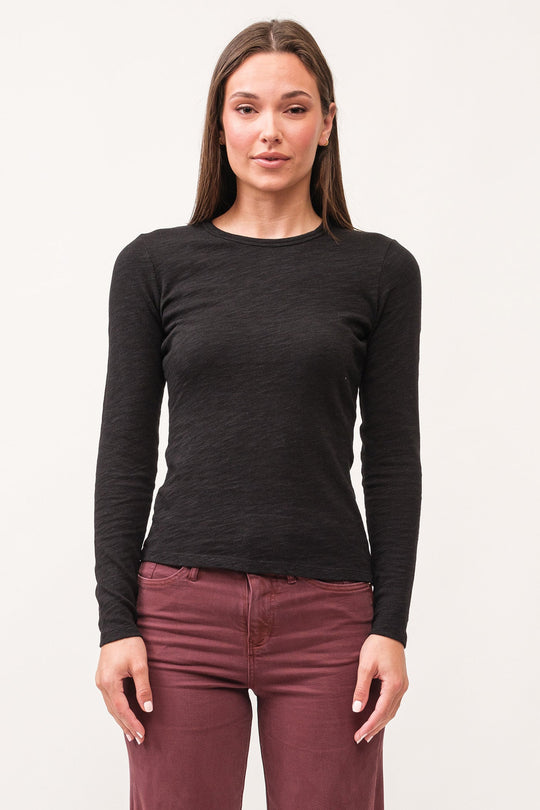 image of a female model wearing a NINA CREW NECK LONG SLEEVE CLASSIC FIT TOP BLACK DEAR JOHN DENIM 