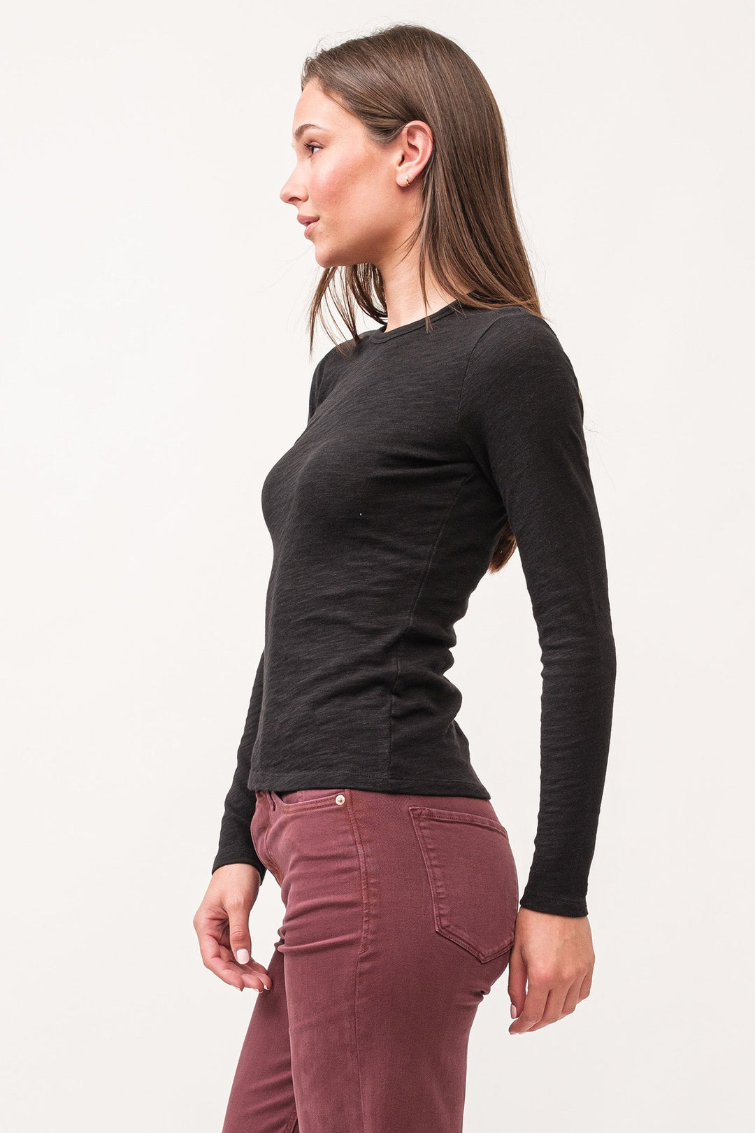 image of a female model wearing a NINA CREW NECK LONG SLEEVE CLASSIC FIT TOP BLACK DEAR JOHN DENIM 