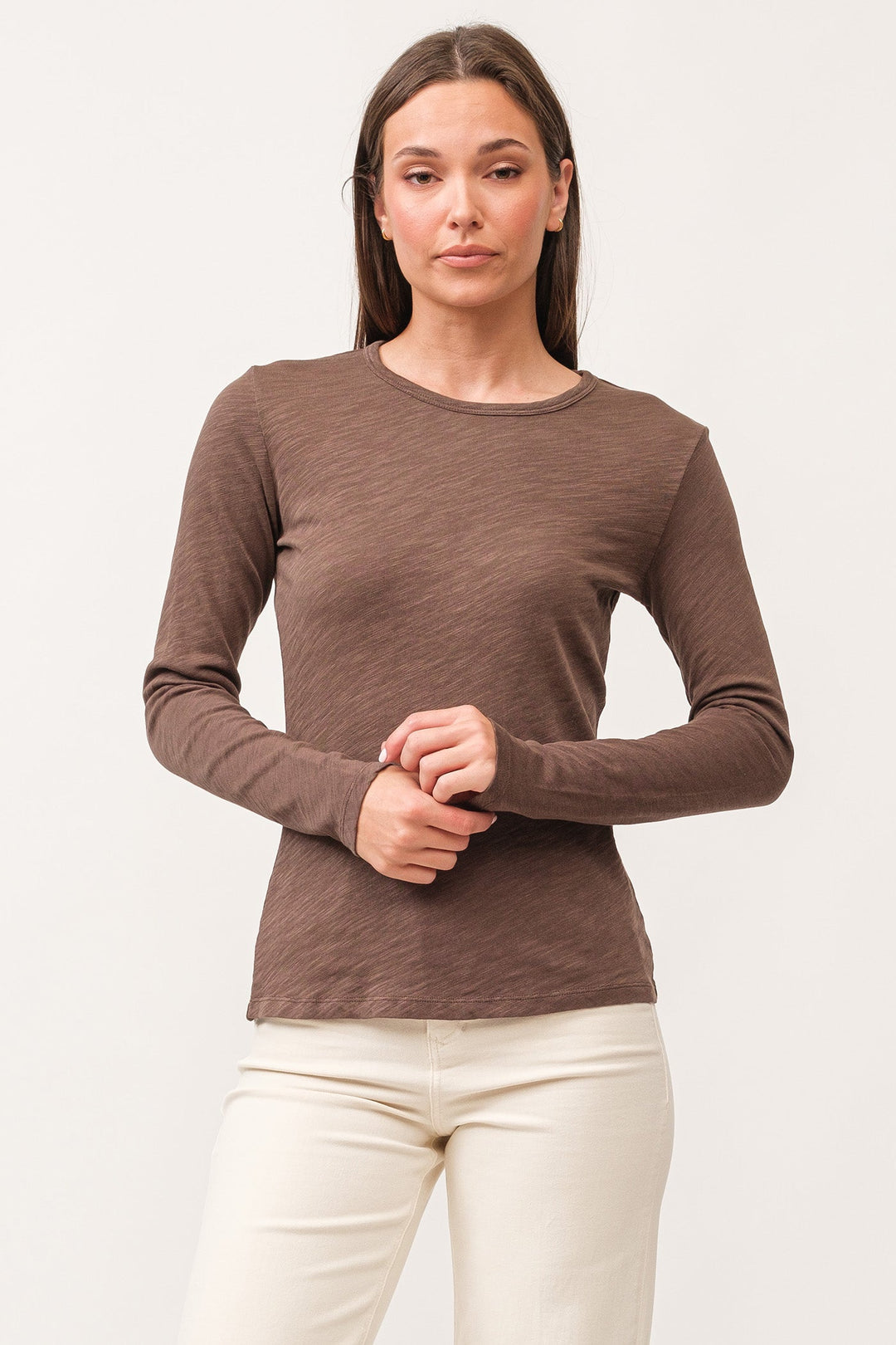 image of a female model wearing a NINA CREW NECK LONG SLEEVE CLASSIC FIT TOP DARK OLIVE DEAR JOHN DENIM 