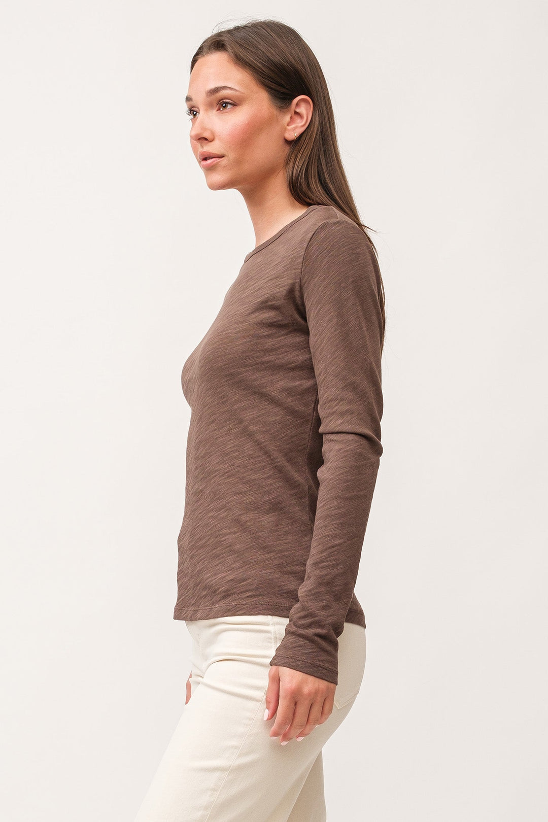 image of a female model wearing a NINA CREW NECK LONG SLEEVE CLASSIC FIT TOP DARK OLIVE DEAR JOHN DENIM 