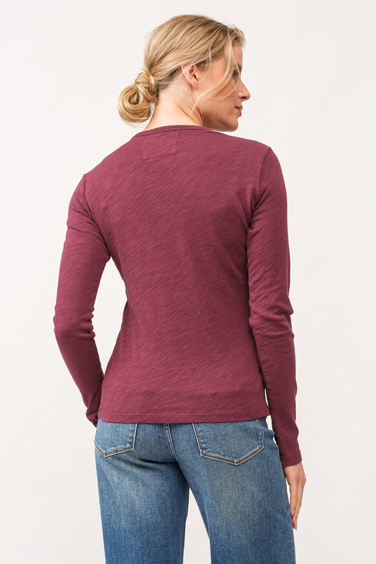 image of a female model wearing a NINA CREW NECK LONG SLEEVE CLASSIC FIT TOP POMEGRANATE DEAR JOHN DENIM 