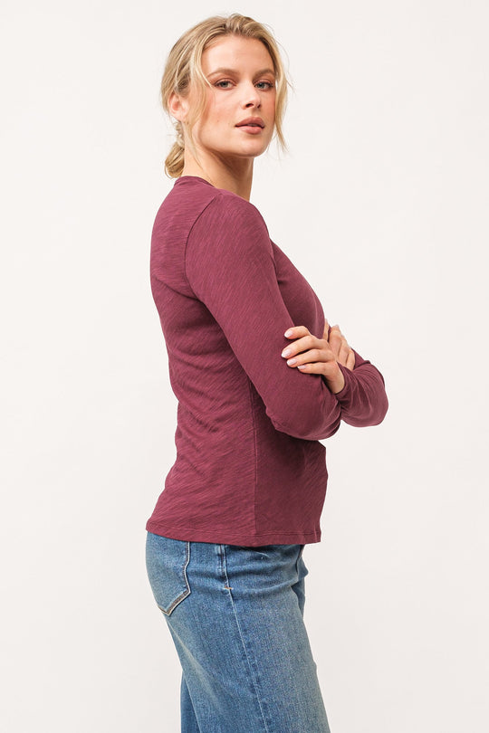 image of a female model wearing a NINA CREW NECK LONG SLEEVE CLASSIC FIT TOP POMEGRANATE DEAR JOHN DENIM 