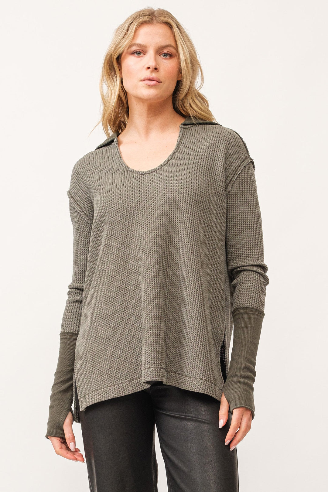 image of a female model wearing a TANYA V-NECK OVERSIZED LONG SLEEVE TOP DARK OLIVE DEAR JOHN DENIM 