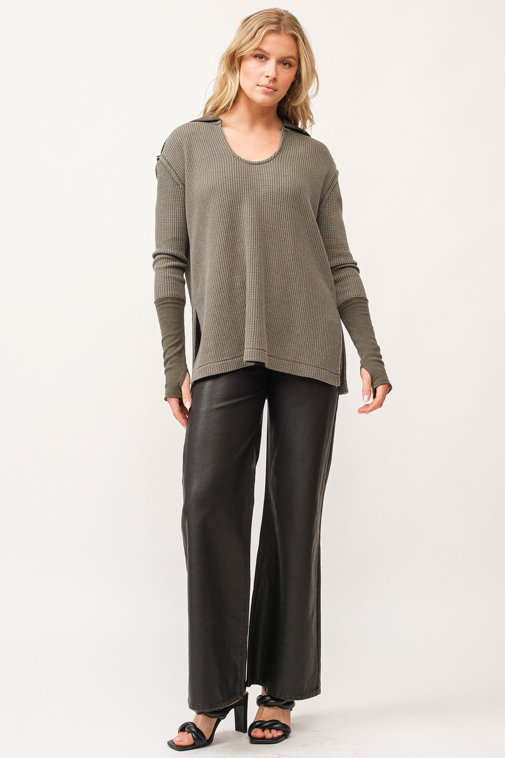 image of a female model wearing a TANYA V-NECK OVERSIZED LONG SLEEVE TOP DARK OLIVE DEAR JOHN DENIM 