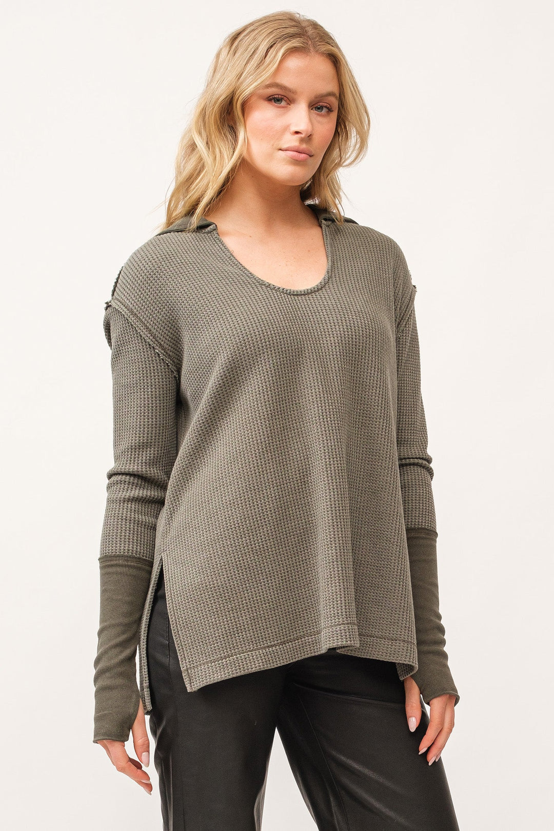 image of a female model wearing a TANYA V-NECK OVERSIZED LONG SLEEVE TOP DARK OLIVE DEAR JOHN DENIM 