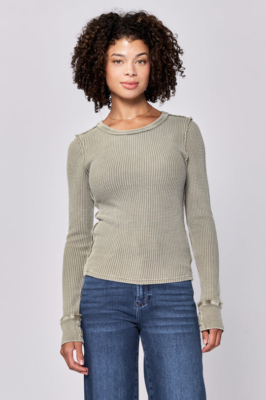 image of a female model wearing a ANIA THERMAL LONG SLEEVE FITTED TOP VETIVER DEAR JOHN DENIM 