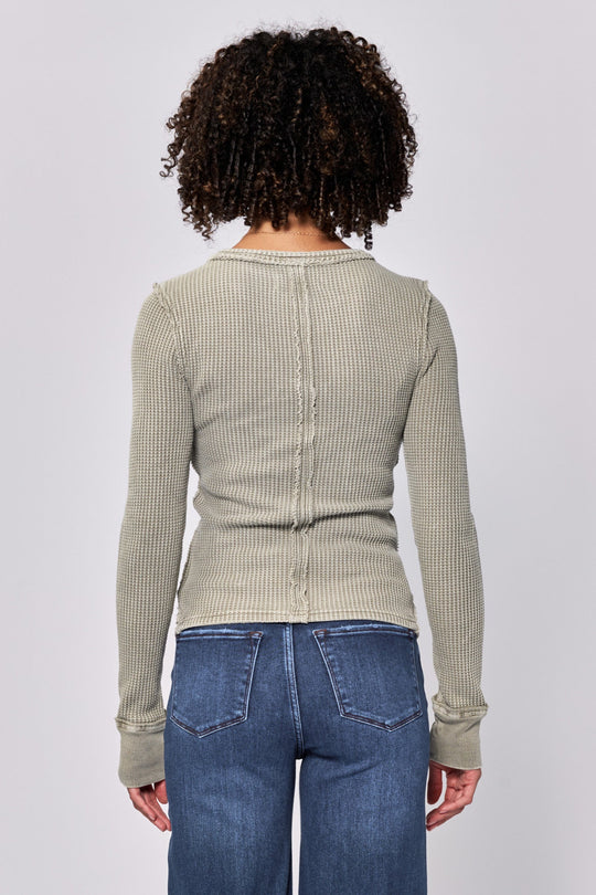 image of a female model wearing a ANIA THERMAL LONG SLEEVE FITTED TOP VETIVER DEAR JOHN DENIM 