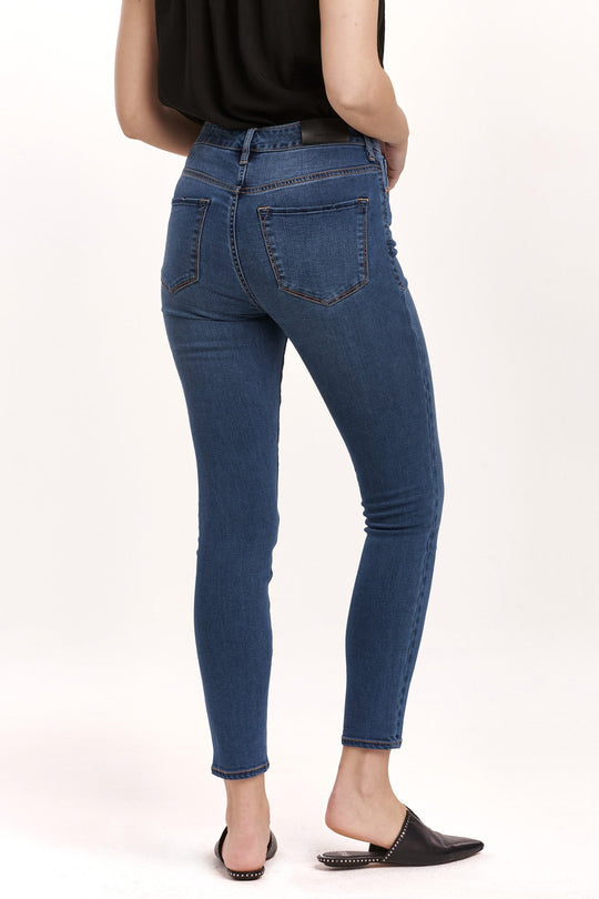 image of a female model wearing a OLIVIA HIGH RISE ANKLE SKINNY JEANS CALIX DEAR JOHN DENIM 