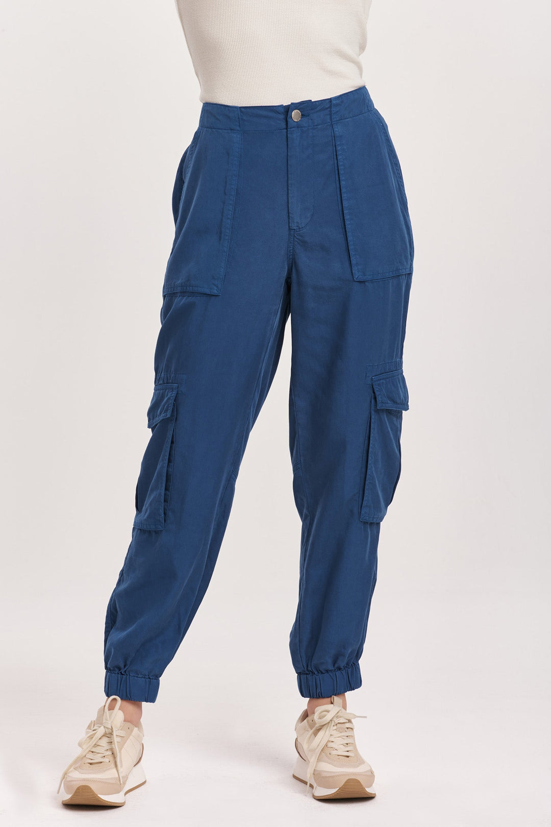 image of a female model wearing a SANDY SUPER HIGH RISE ANKLE TROUSER PANTS BLUEBERRY DEAR JOHN DENIM 