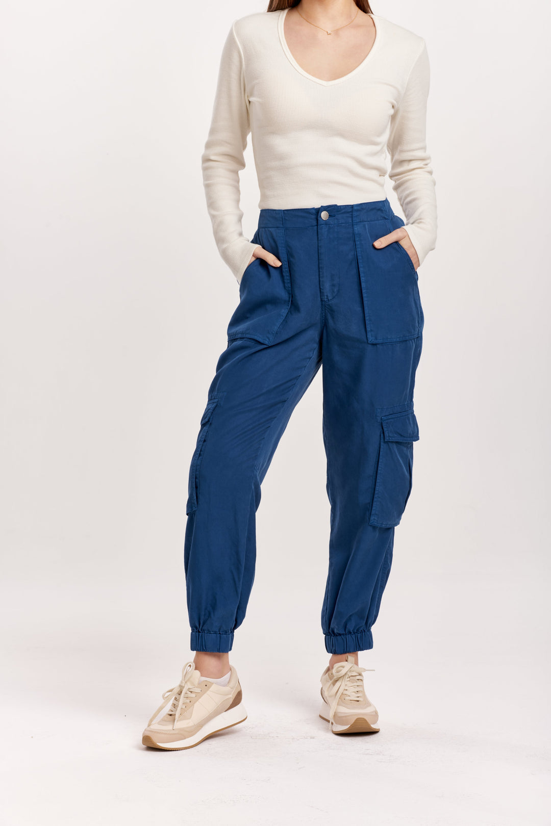 image of a female model wearing a SANDY SUPER HIGH RISE ANKLE TROUSER PANTS BLUEBERRY DEAR JOHN DENIM 