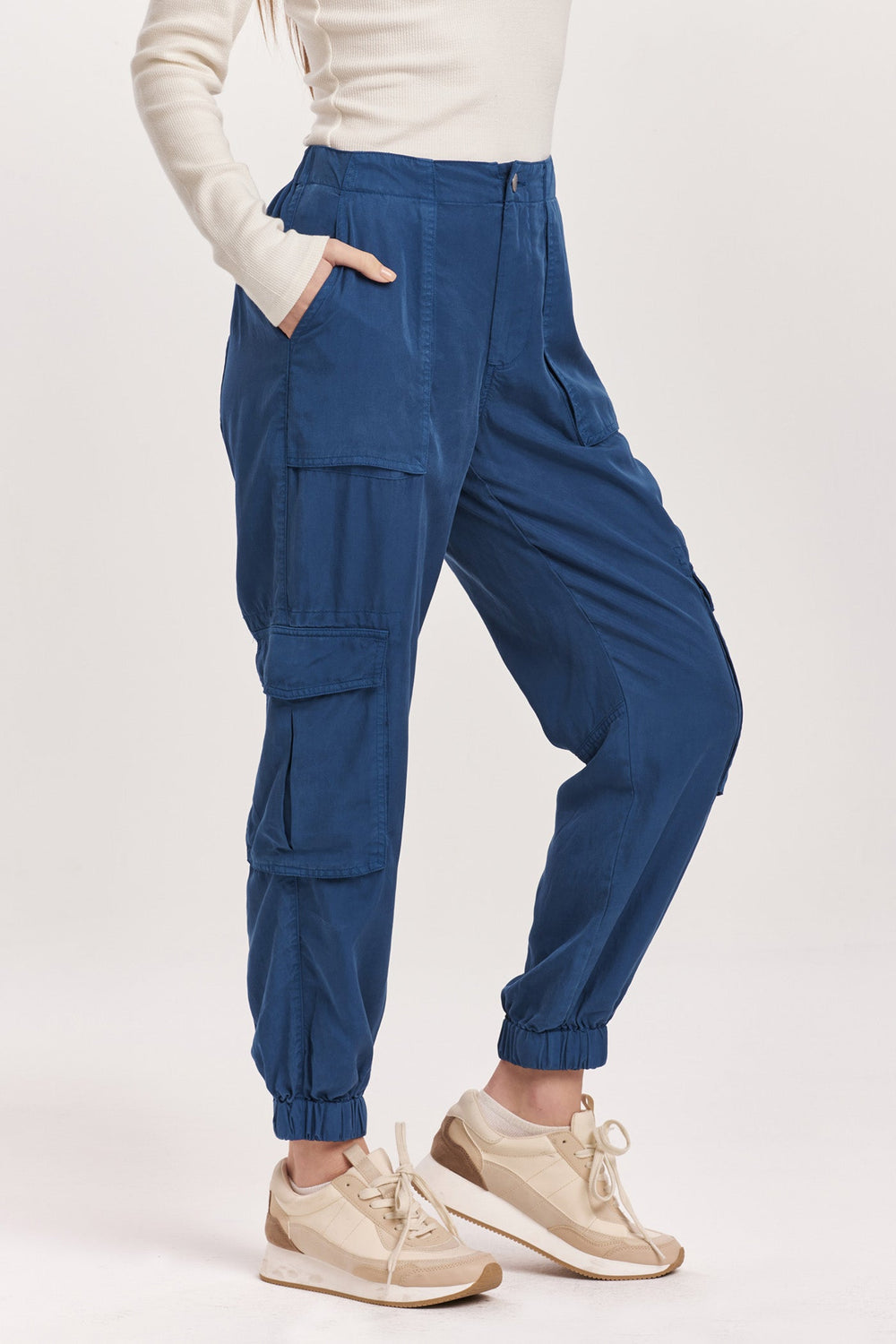 image of a female model wearing a SANDY SUPER HIGH RISE ANKLE TROUSER PANTS BLUEBERRY DEAR JOHN DENIM 