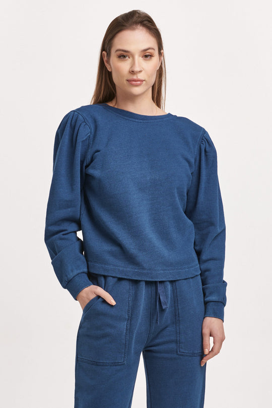 image of a female model wearing a RAYA SCOOP BACK SWEATSHIRT DARK INDIGO DEAR JOHN DENIM 