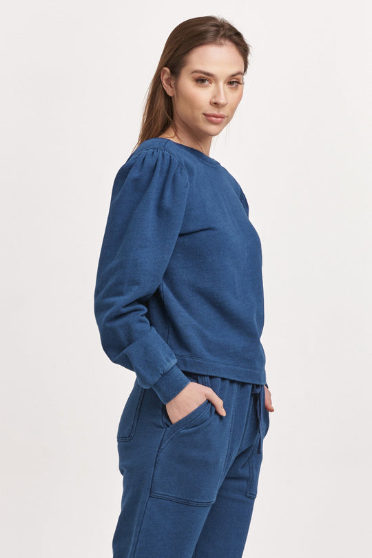 image of a female model wearing a RAYA SCOOP BACK SWEATSHIRT DARK INDIGO DEAR JOHN DENIM 